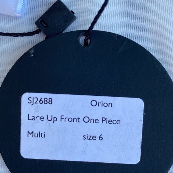 Orion Deep V Lace Up Front One Piece Swim Suit In White Navy Multi - Picture 10 of 13